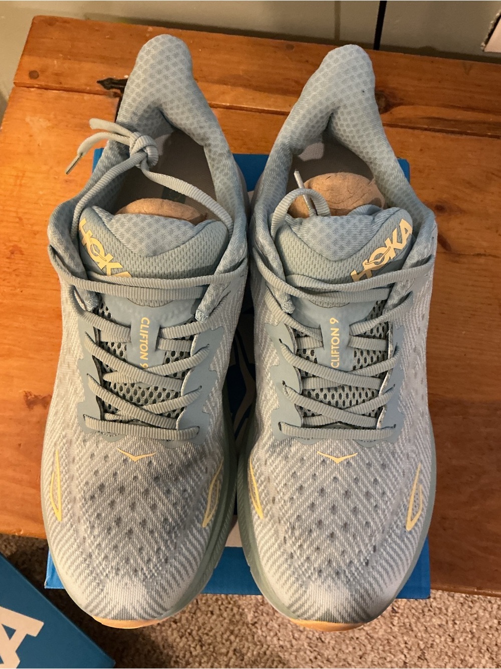 Hoka Clifton 9 Men's Running Shoes in Pale Blue with Yellow Accents size 11.